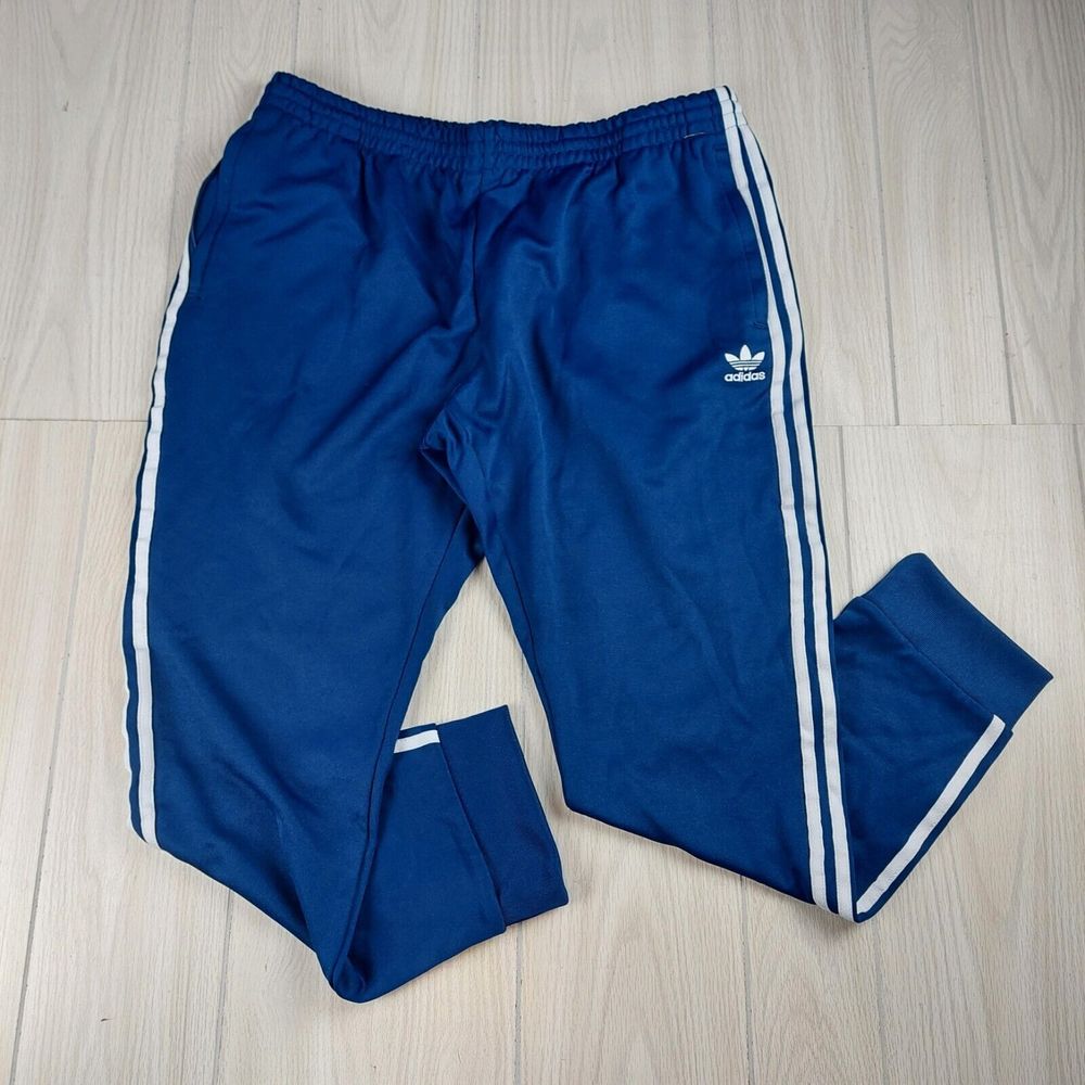 Adidas Navy Blue Track Pants with White Stripes